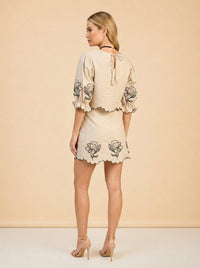 Joey Taupe Cropped Puff Sleeve Top and Matching Skirt with Black Floral Embroidery by Benaar LA — over the shoulder